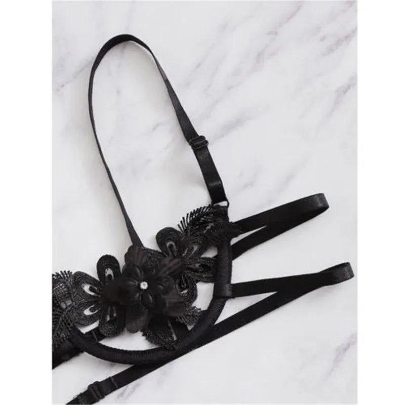 Women's black half-cup unlined bra and brief lingerie set with adjustable straps