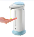 Automatic sensor soap dispenser on a desktop, white ABS plastic body with infrared sensor.