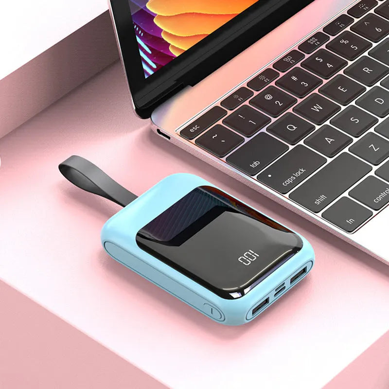 White 20000mAh portable power bank with multiple USB output ports on a plastic shell