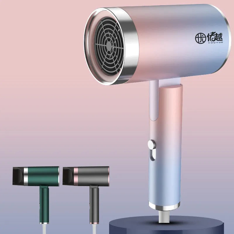 Foldable negative ion hair dryer in emerald green with folding handle design