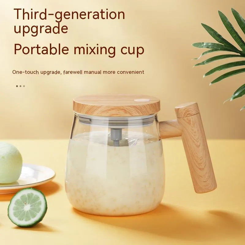 Clear borosilicate glass self-stirring coffee mug with button on base, 400ml capacity