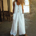 Cotton sleeveless jumpsuit in a wide leg style with a pocket, shown in Army Green colour.