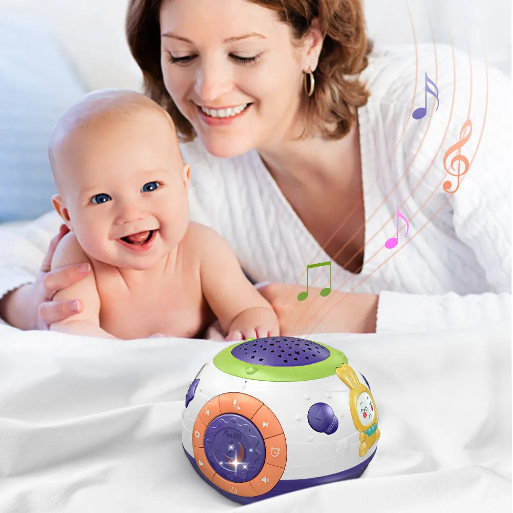 White plastic starry sky night light projector for children on a table.