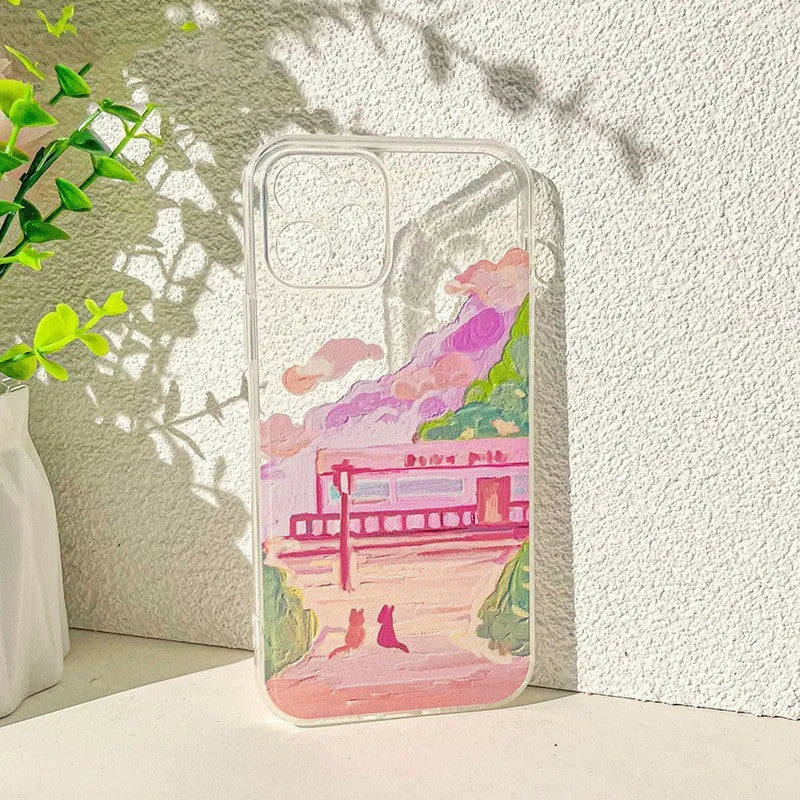 Soft silicone iPhone case with a colourful two cat cartoon design on the back