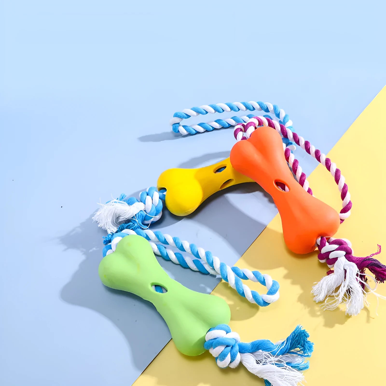 Porous bone rope knot dog chew toy with food compartments in green colour