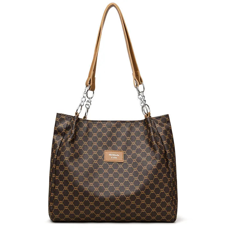 Retro women's handbag in soft brown PU leather with polyester lining.