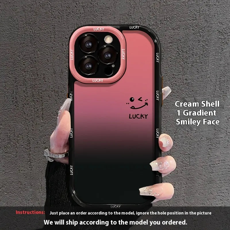 Acrylic hard shell iPhone case with fine hole pattern and a gradient love heart design on a cream and black background.