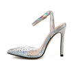 Women's pointed-toe PVC sandals with a stiletto heel on a plain background.