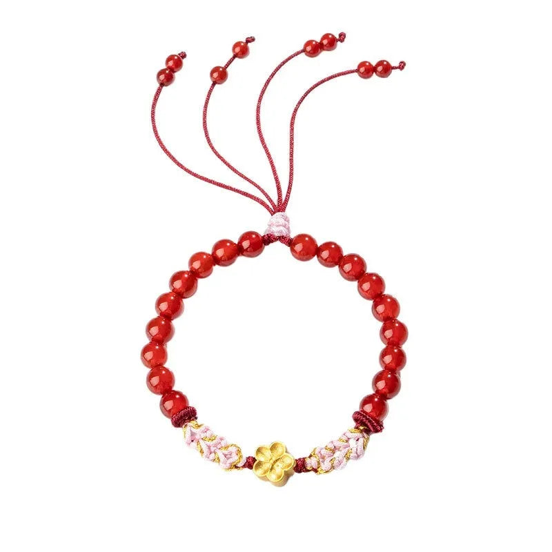 Chinese style women's bracelet with hand-woven red rope and peach blossom crystal charms