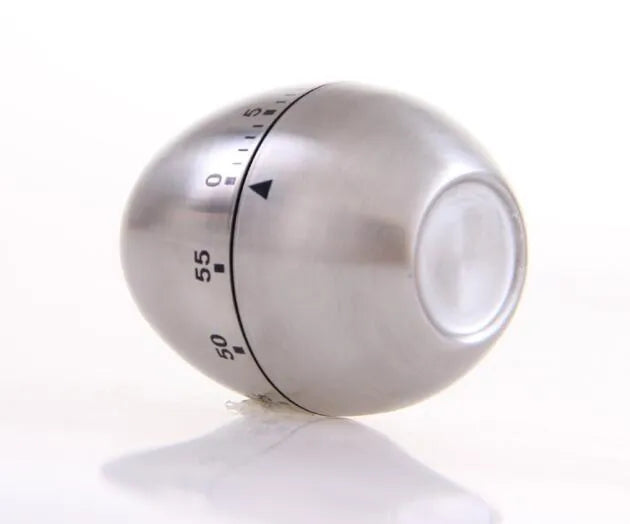 Stainless steel egg-shaped mechanical kitchen timer with dial showing 60-minute range