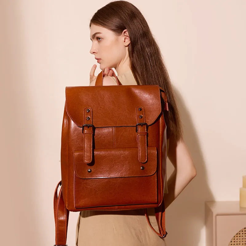 Women's leather computer backpack in black made from two-layer cowhide with hard structure