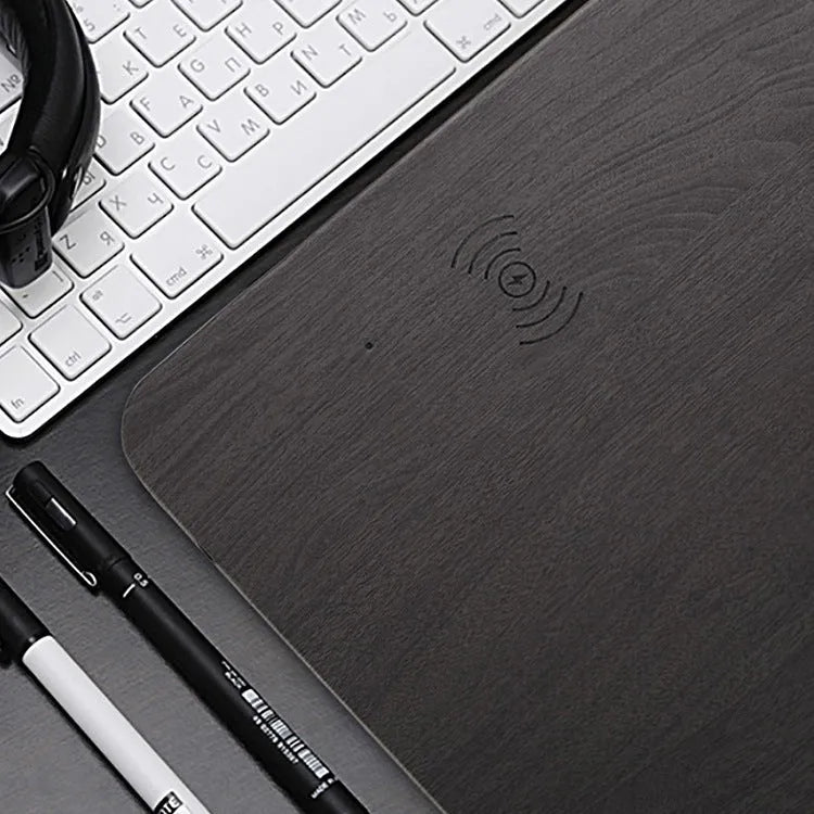 Wooden wireless charger with PU leather surface in brown finish on a desk
