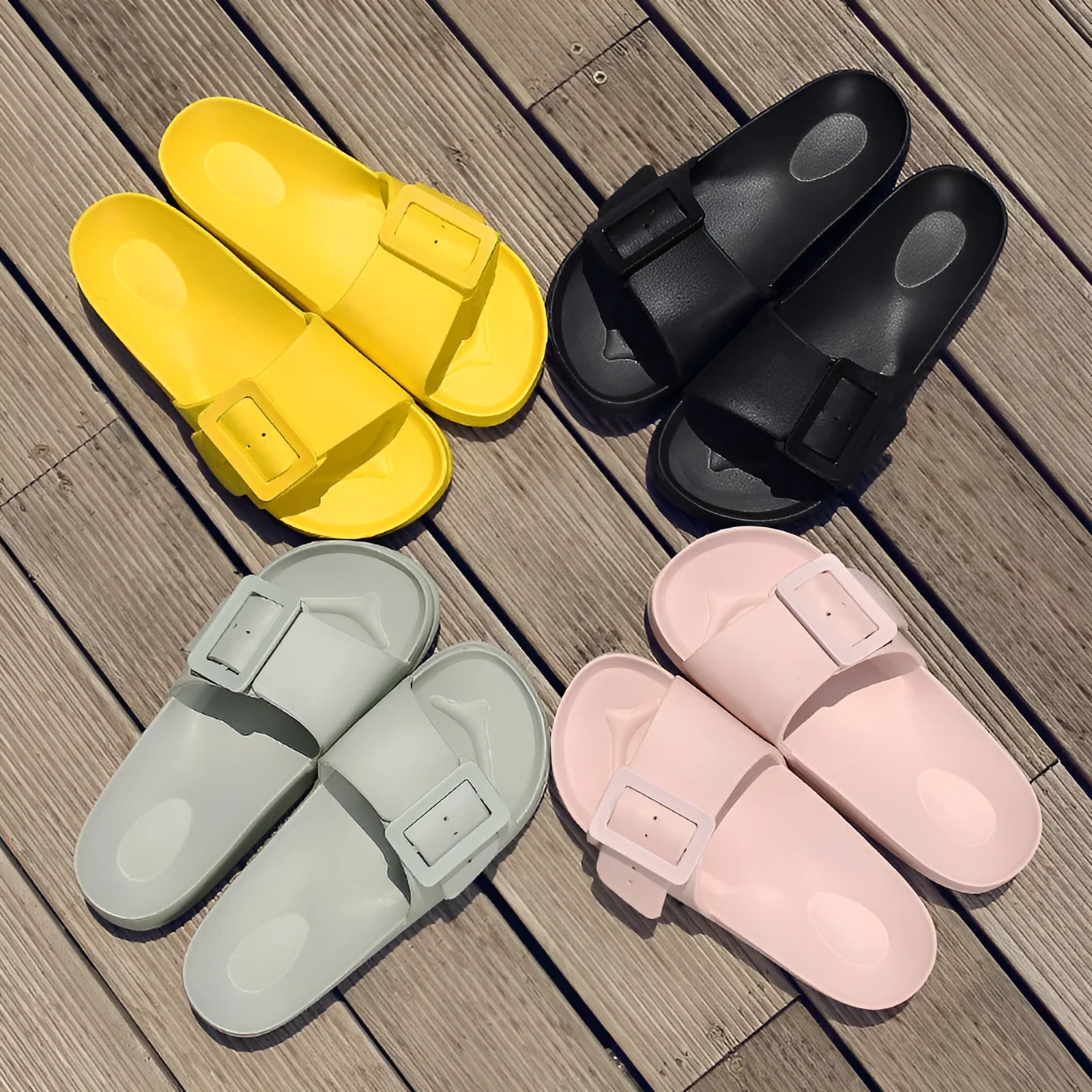Women's grey blue EVA buckle slipper with a 1.5cm thick sole and adjustable strap.