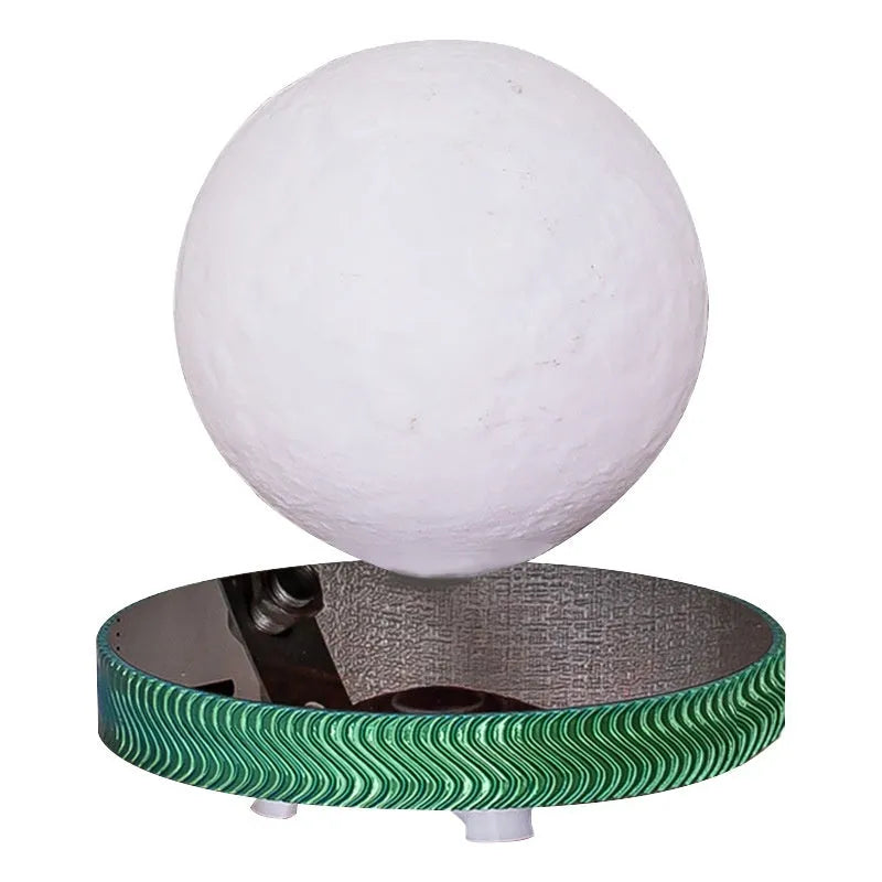 Modern magnetic suspension night lamp showing a levitating moon ornament with soft glow