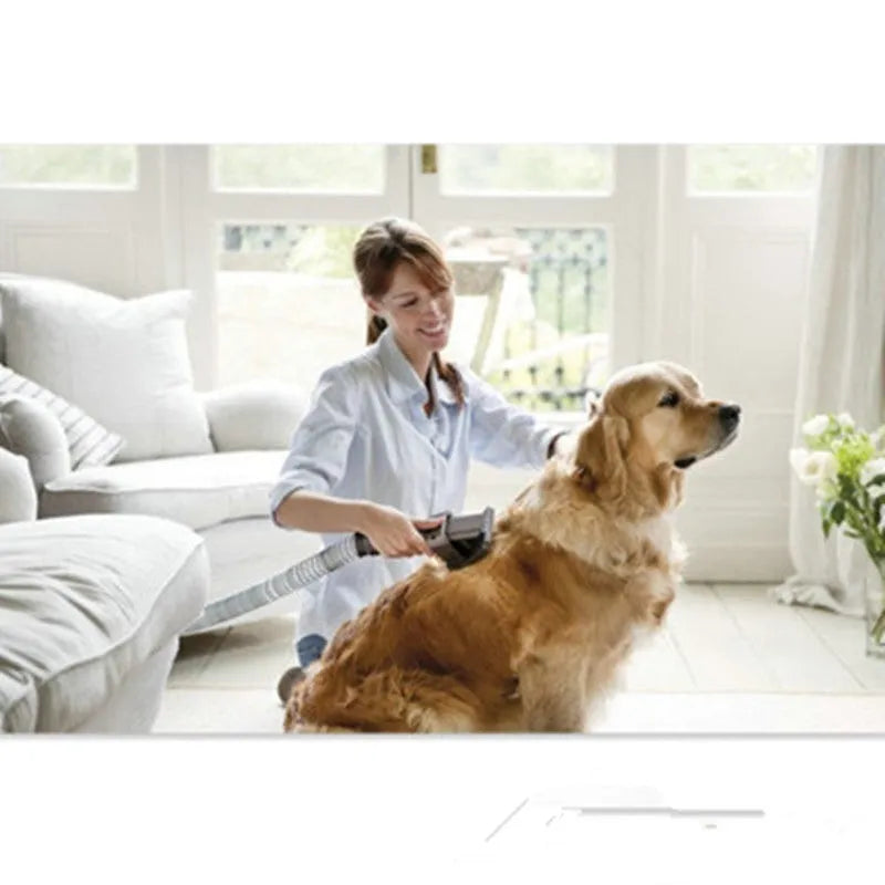 Deep grey pet grooming brush tool with vacuum attachment, 17 x 10 cm, on a plain background
