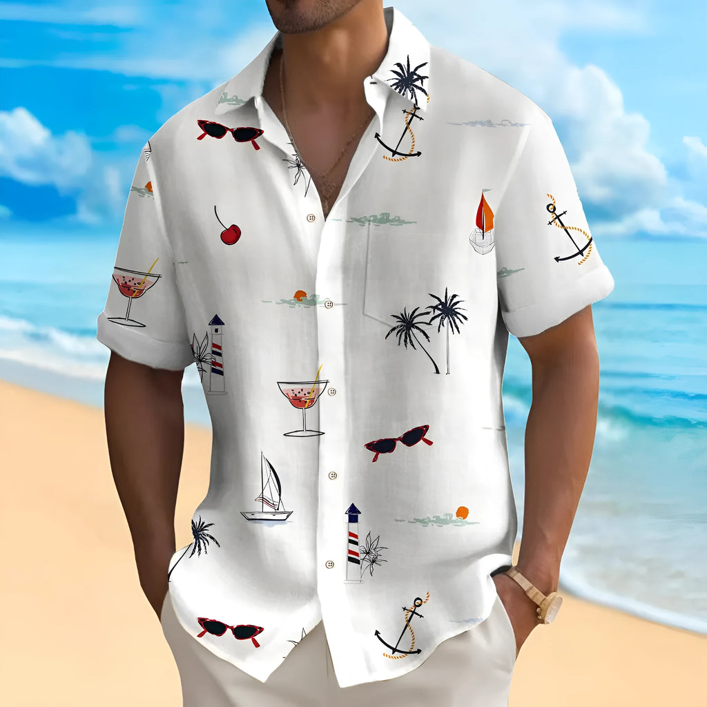 Man wearing a colourful loose-fit Hawaiian print short sleeve shirt.