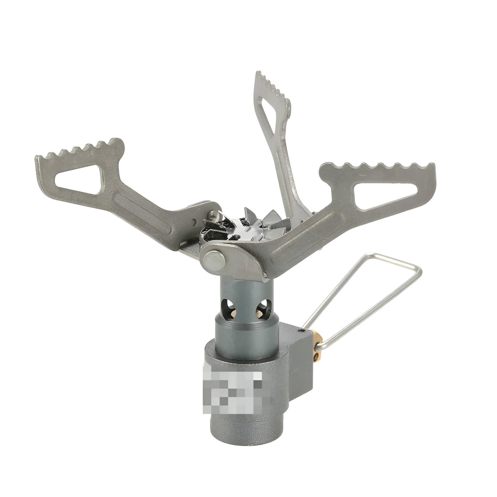 Portable gas camping stove with a one-piece metal furnace body, shown on an outdoor surface.