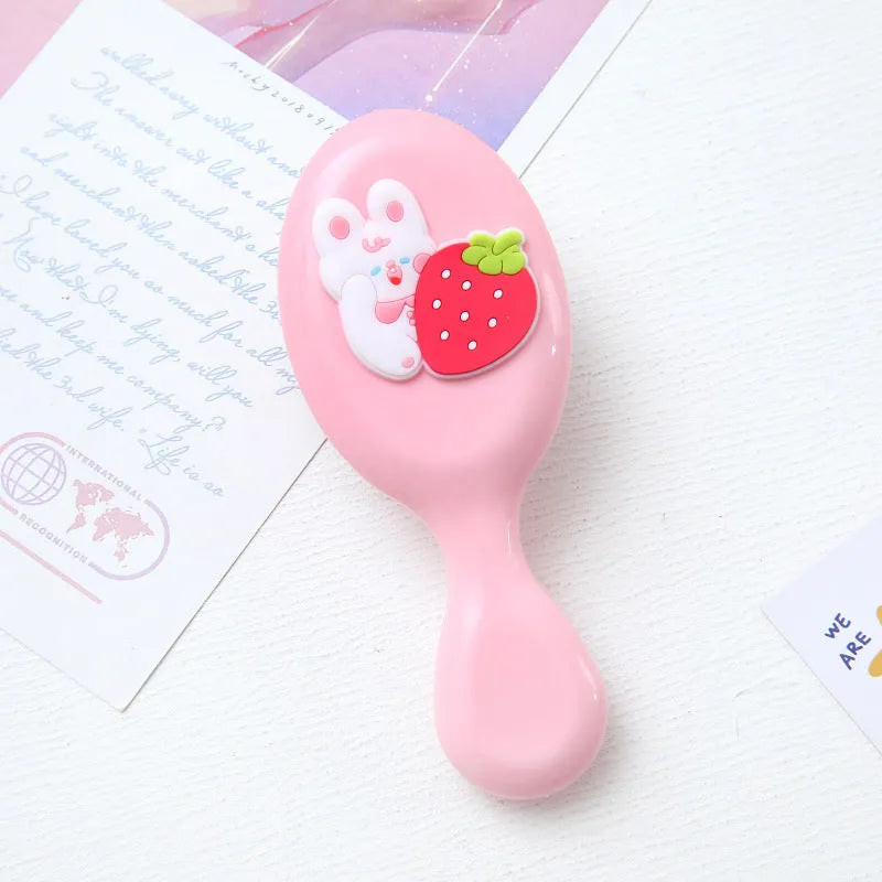 Cute portable resin massage comb for kids in strawberry design, 15-20 cm, soft bristles for detangling