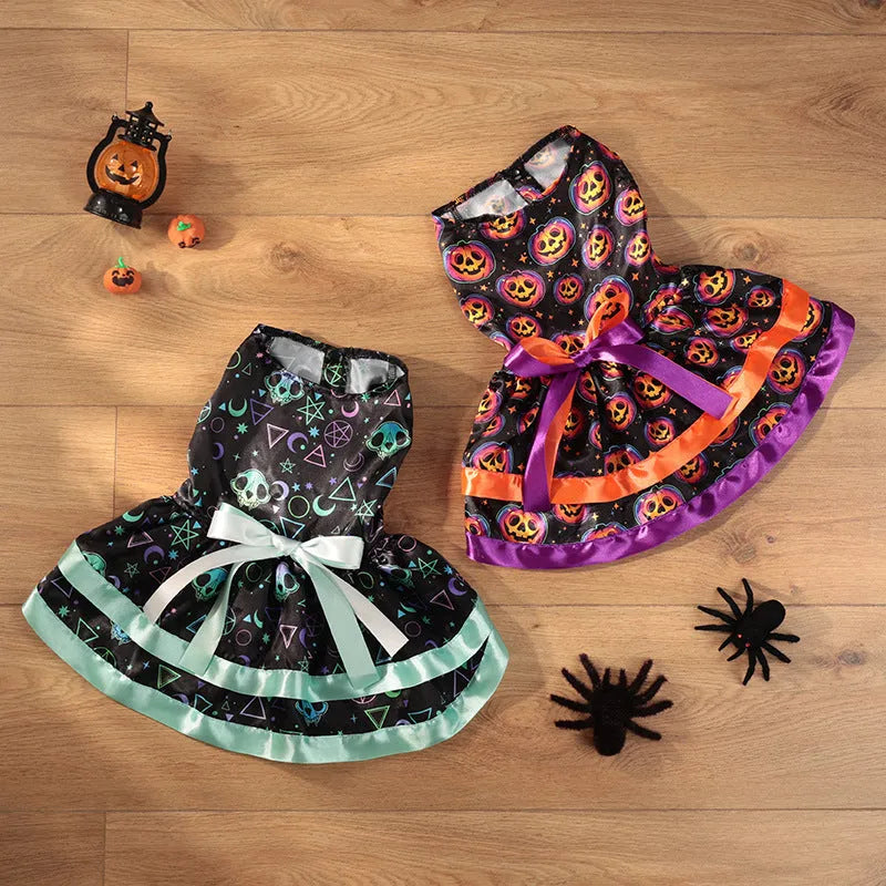 A dog wearing a double-layer Halloween skirt with a colourful pumpkin print.