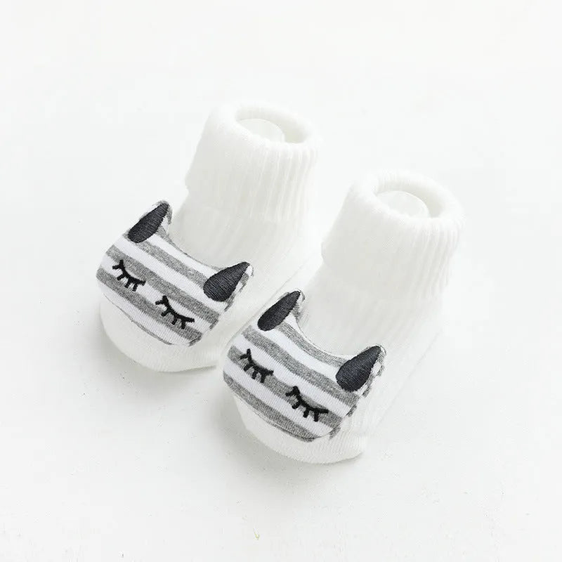 Non-slip baby socks with dispensing glue feature in cotton material, showing mid-calf height and colour options