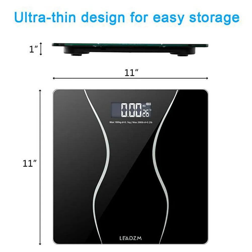 Black electronic digital body scale on a floor, showing a weight reading.