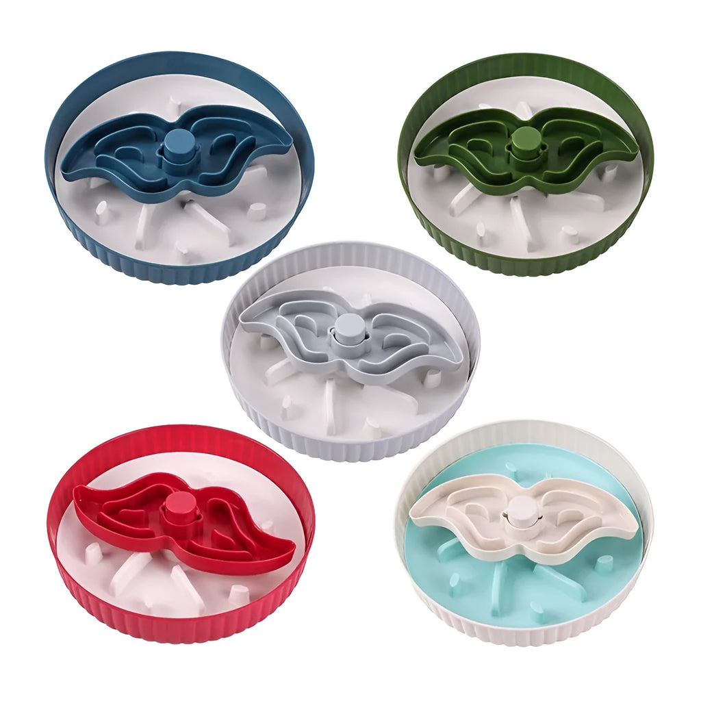 Interactive rotating slow-feed dog bowl with blue silicone licking mat in a windmill pattern.