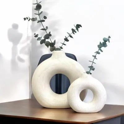 A simple modern frosted porcelain biscuit vase for flower arranging, shown in a neutral colour.