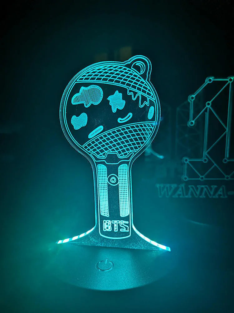 Clear acrylic stand for BTS Light 101 BTS Tower Gem album display on a table.