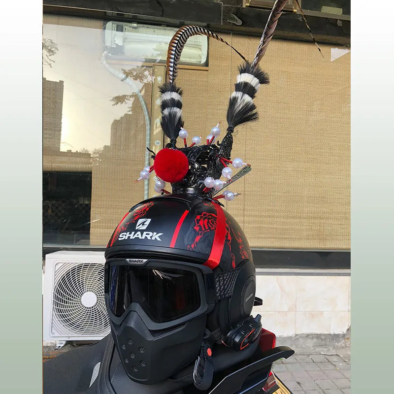 Black crown and long feather decoration for customising a motorcycle helmet.