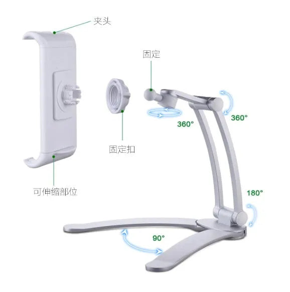 Silver aluminium desktop stand holding a tablet, showing 360-degree rotation and adjustable clamp mechanism.