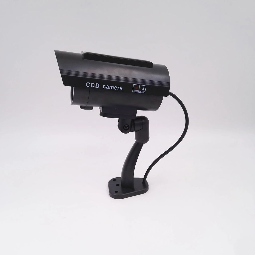 Black solar simulation gun camera security deterrent with flashing red LED light for property protection