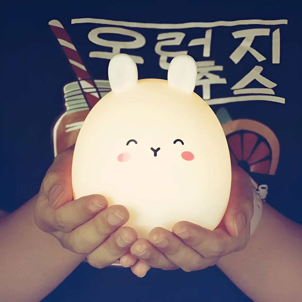 Silicone rabbit-shaped rechargeable night light with colour-changing LED illumination