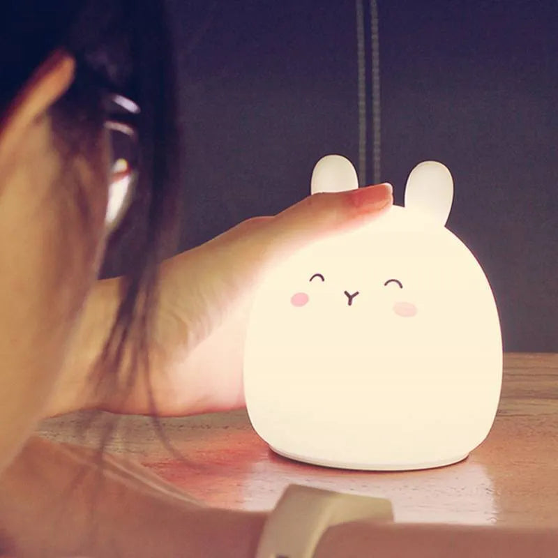 Silicone rabbit-shaped rechargeable night light with colour-changing LED illumination