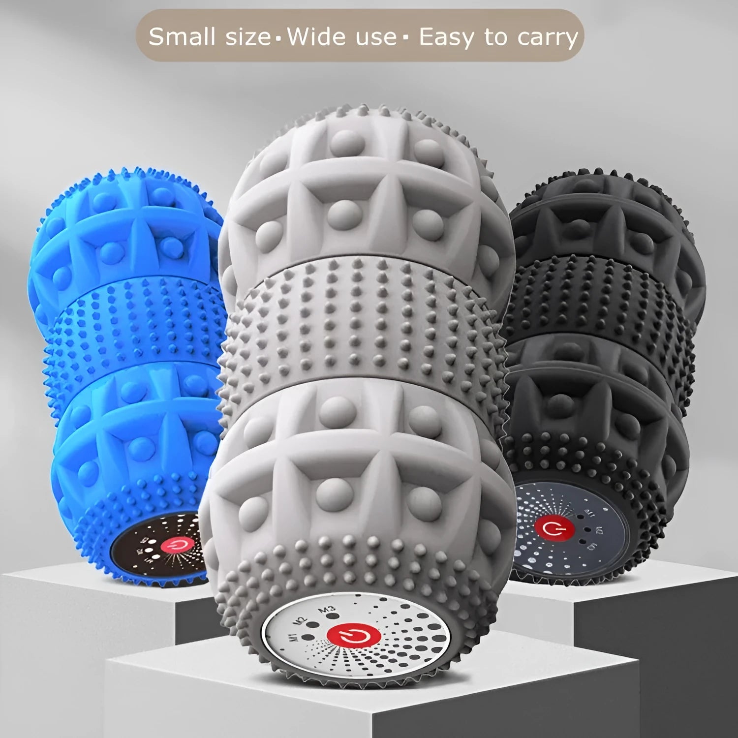 Electric vibrating peanut massage ball in blue-black-grey eco-friendly silicone on a white background