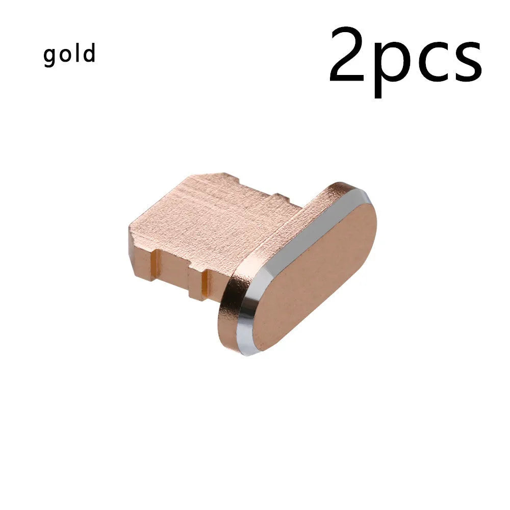 Aluminium alloy charging port dust plug for iPhone in various metallic colours including gold and rose gold.