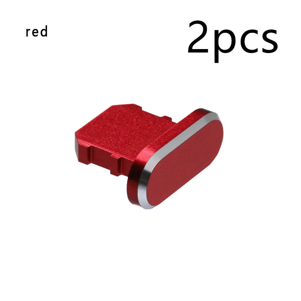 Aluminium alloy charging port dust plug for iPhone in various metallic colours including gold and rose gold.