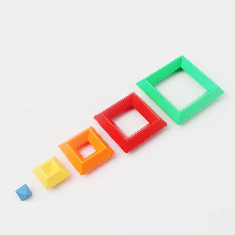 Rainbow coloured tower ring building blocks set for children, with plastic ABS pieces in a barrel.