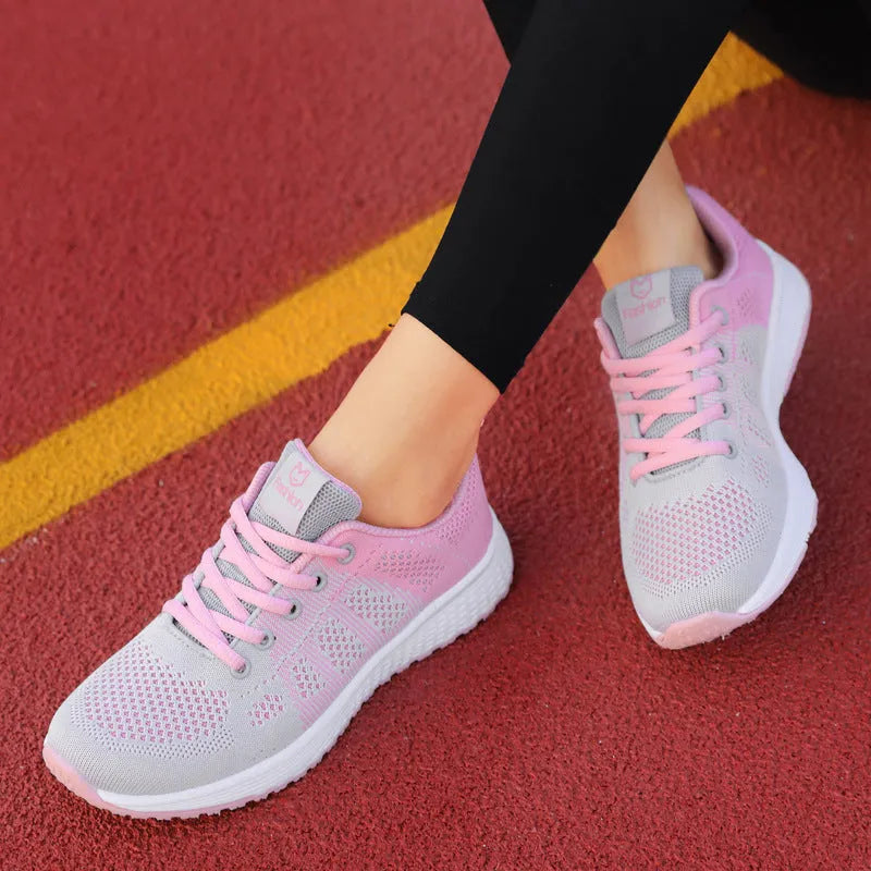 Women's white flat board high-top casual shoes with back lacing and a cross strap.