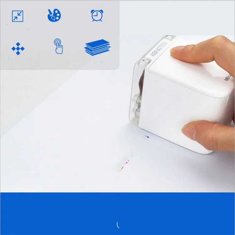 Portable Mbrush color handheld printer in white with ink cartridges showing compact size
