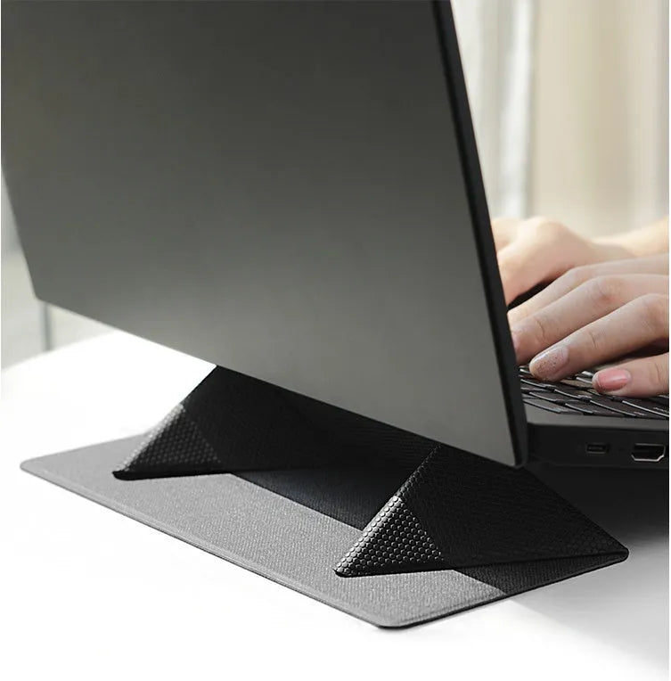 Blue portable laptop cooling bracket showing foldable design with anti-slip surface