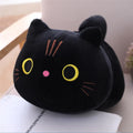 Large grey cat plush toy pillow on a sofa showing its soft texture and size.