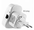 Black and white WIFI repeater with network cable and multiple international plug options on a table.