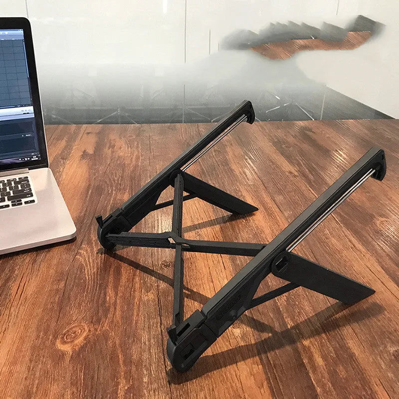 Folding notebook stand in reinforced nylon, black, with laptop raised for airflow