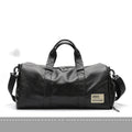 Black large capacity waterproof PU leather sports training bag with multiple zipper pockets and a single strap.