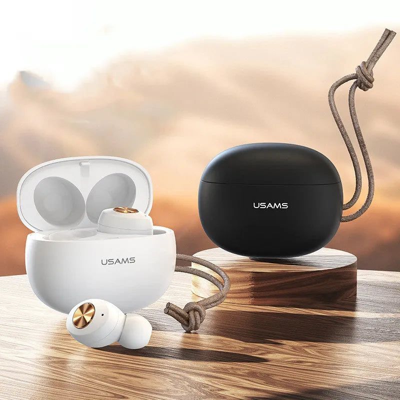 Pebble Series wireless Bluetooth earbuds in charging case, shown in black, white, or dark green.