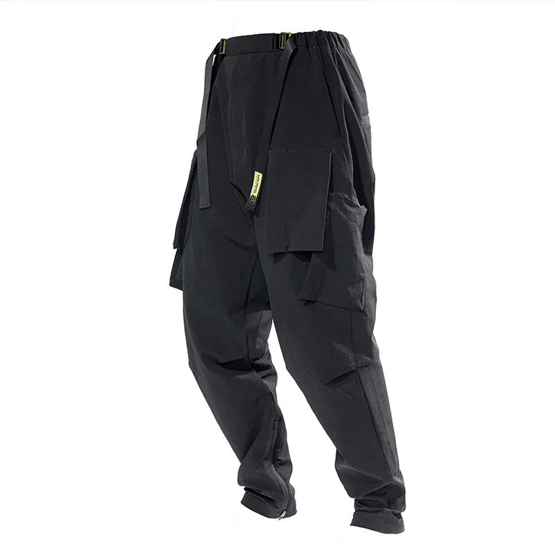 New men's black casual pants with loose fit and pockets on a model