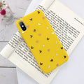 Transparent iPhone case with small flower and wave dot pattern in multiple colour options