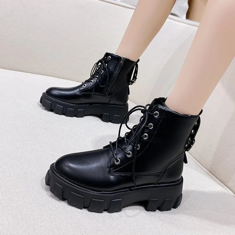 Women's Martin boots in artificial PU with belt buckle and lace front in black, size 38
