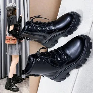 Women's Martin boots in artificial PU with belt buckle and lace front in black, size 38