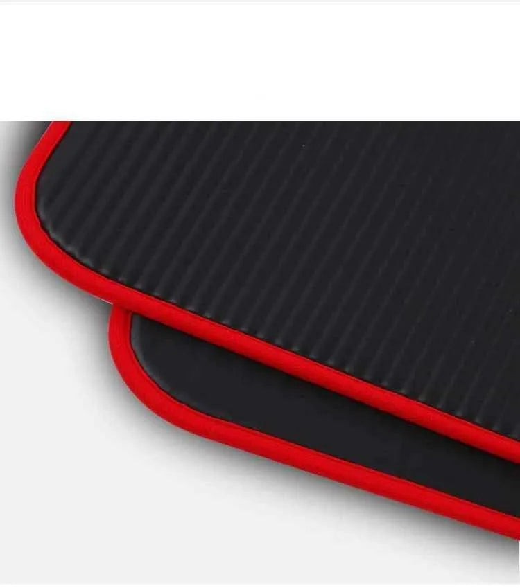 10mm thick black NBR yoga mat measuring 60 by 181 centimetres on a floor